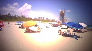 Strolling Through the Sand at Haulover Naturist Beach