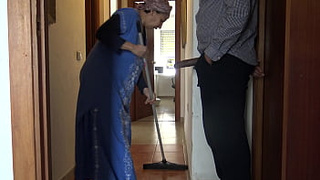 A Muslim cleaning maid is disturbed when she sees his large ebony penis