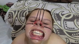 FAT WOMAN BONDAGE face with spunk on it