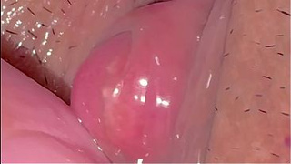 A virgin's alluring pink clitoris.