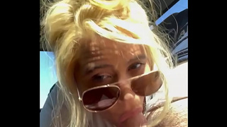 Streetwalker wearing sunglasses gives an incredible oral sex and takes a enormous cumshot