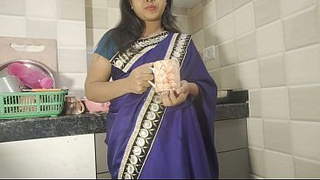 Desi Bhabhi was drinking tea in the kitchen when her neighbor came and slammed her.